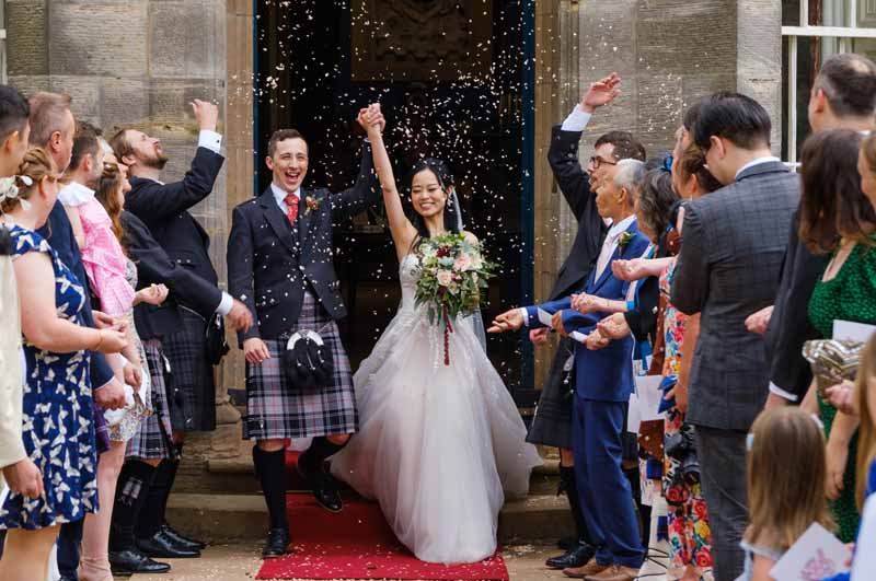 David and Scarlett's Scottish Chinese Wedding with confetti - Winton Castle